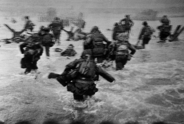 FRANCE. Normandy. June 6th, 1944. US troops assault Omaha Beach during the D-Day landings.