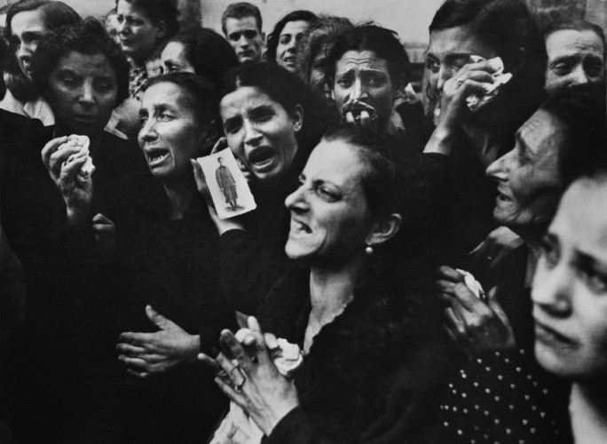 ITALY. Naples. October 2nd, 1943. Women crying at funeral of twenty teenaged partisans who had fought the Germans before the Allies entered the city.